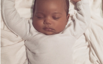 Kim Kardashian introduced her second child Saint West on the occasion of her late father's birthday.