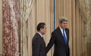 U.S. Secretary of State John Kerry and Chinese Foreign Minister Wang Yi seen before a meeting at the State Department in Washington on Tuesday. 