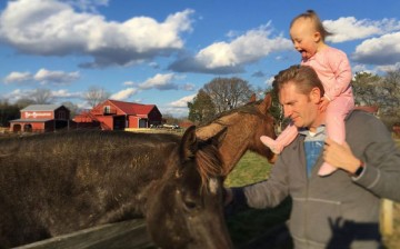 Seen here are Rory Feek along with his toddler daughter. Rory founded a duo with his wife Rory Feek called Joey+Rory and released several hits including 