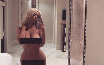 Kim Kardashian posted a nude Instagram photo early on Monday to show how she has lost her weight