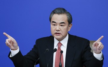 Chinese Foreign Minister Wang Yi speaks to reporters at the 12th National People's Congress (NPC) in Beijing, China, on March 8, 2016. 