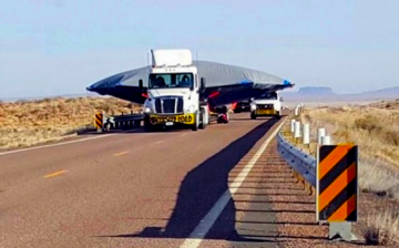 A witness claims recently to have come across a truck carrying what seems to be a flying saucer near the vicinity of Area 51.