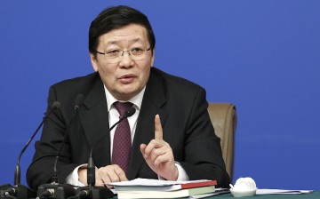 Finance Minister Lou Jiwei is unfazed by downgraded rating on China's economy.
