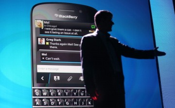  BlackBerry Chief Executive Officer Thorsten Heins speaks in front of a display of one of the new Blackberry 10 smartphones at the BlackBerry 10 launch event.