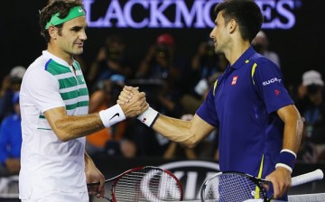 Novak Djokovic of Serbia shakes hands after winning in his semi final match against Roger Federer of Switzerland during day 11 of the 2016 Australian Open at Melbourne Park in Melbourne, Australia. 