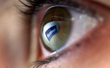 In this photo illustration the facebook logo is reflected in the eye of a girl on February 3, 2008 in London, England.