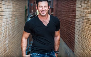 An image of Craig Strickland posing for a photoshoot.