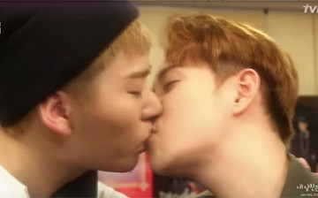 Block B's Zico and Park Kyung exchange a kiss in fanfic segment.