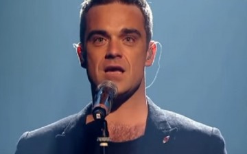 Singer Robbie Williams will join former bandmates Take That for a reunion tour in 2017.