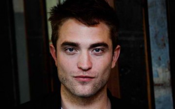 Robert Pattinson attends a photo call for 