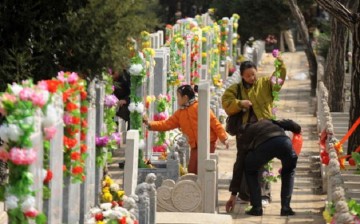 Where have all the flowers gone: Garlands adorn the tombstones of this cemetery. Some foreigners chose to be laid to rest in China.