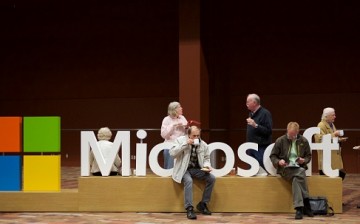Microsoft shareholders wait for the annum Microsoft Shareholders Meeting December 3, 2014 in Bellevue, Washington.