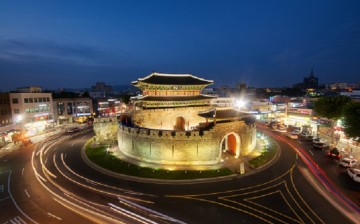 In the middle of it all: The southern gate of South Korea’s Hwaseong Fortress in Suwon, Gyeonggi-do, lights up at night.