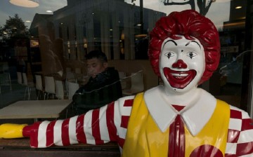 A smile a day keeps the worries away: A Ronald McDonald statue outside a McDonald's outlet in Hangzhou, Zhejiang Province.