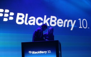 Workers prepare the stage during BlackBerry 10 launch event in 2013.