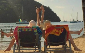 These women enjoy their summer break by choosing to relax by the beach in St. Lucia