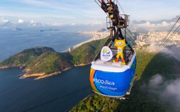Vinicius, the Olympic mascot, starts the countdown for the Rio 2016 Olympic Games as it rides from the top of the Sugarloaf Cable Car in Rio de Janeiro, Brazil, on March 23, 2015.