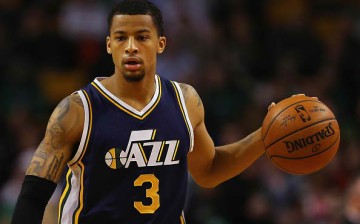 Trey Burke of the Utah Jazz carries the ball