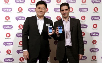 Rakuten, Inc. CEO Hiroshi Mikitani and Viber CEO Talmon Marco pose for photos in 2014. 