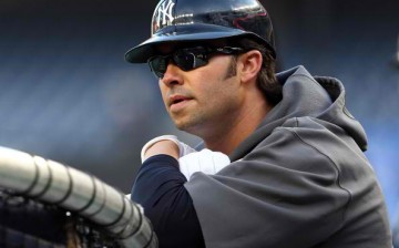 Nick Swisher of the New York Yankees looks on during batting practice in 2012.