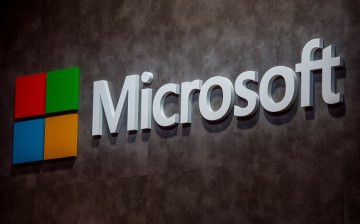 A logo sits illuminated outside the Microsoft pavilion on the opening day of the World Mobile Congress at the Fira Gran Via Complex on Feb. 22, 2016 in Barcelona, Spain. 