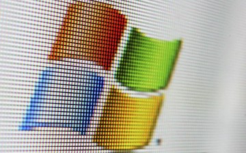 In this photo illustration the logo of the multi-facetted internet giant Microsoft is displayed on a computer screen on April 13, 2006 in London, England. 