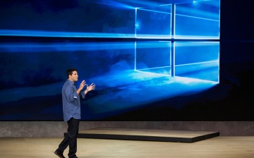 Terry Myerson, executive vice president of operating systems at Microsoft, speaks for new Windows 10 products at a media event in 2015. 