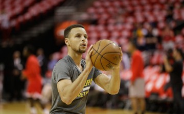 Stephen Curry warms up before playing in game 4 of the first round of the Western Conference playoffs. 