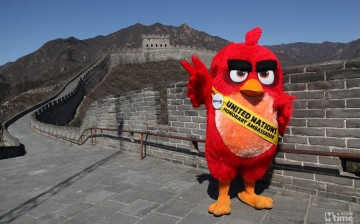 The red Angry Bird poses for a photo at the Great Wall in Beijing. 