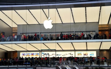 Customers experience Apple products at a new-opened Apple Store in Tianhe District on Feb. 2, 2016 in Guangzhou, Guangdong Province of China. 