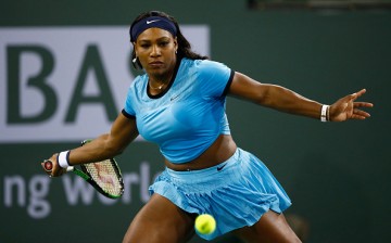 Serena Williams of USA in action against Agnieszka Radwanska of Poland during day twelve of the BNP Paribas Open at Indian Wells Tennis Garden on March 18, 2016 in Indian Wells, California.