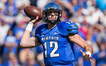 Paxton Lynch of the Memphis Tigers throws a pass during a game against the Ole Miss Rebels. 