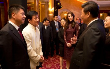 Catherine, Duchess of Cambridge, Chinese President Xi Jinping and his wife, Madame Peng Liyuan talk with Kung-Fu star Jackie Chan as they attend a 'Creative Collaborations: UK & China' event at Lancaster House on Oct. 21, 2015 in London, England. 