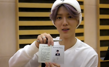 Luhan shows his school registration in the 