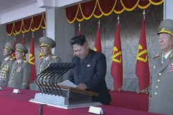 The North Korean president Kim Jong-Un giving a speech during a massive military parade held prior to 70th anniversary of the ruling Workers' Party. 