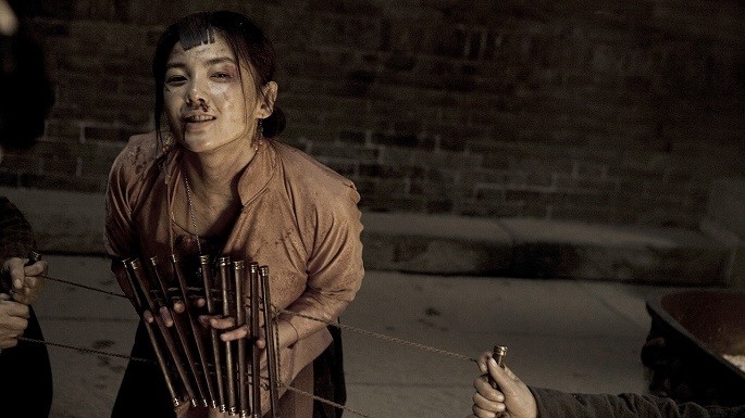 Tian (Zhang Yuqi) faces the consequences of her actions in a scene in the drama, “White Deer Plain” (2012), directed and written by Wang Quan’an.