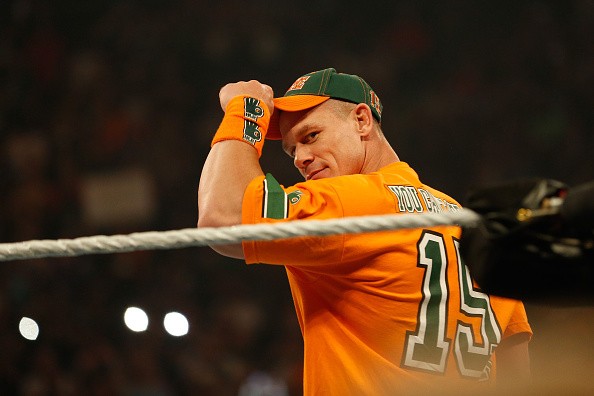 John Cena salutes the crowd at WWE SummerSlam 2015.