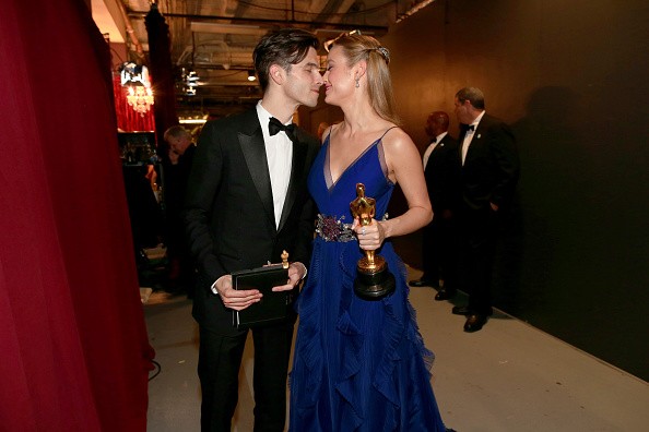Actress Brie Larson (R), winner of Best Actress for 'Room,' and musician Alex Greenwald backstage at the 88th Annual Academy Awards at Dolby Theatre on February 28, 2016 in Hollywood, California.