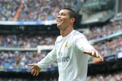 Real Madrid star Cristiano Ronaldo is celebrating after he scored a goal against Valencia.  