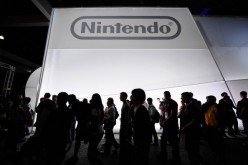 Crowds line up to view the new Nintendo game console Wii U, not the Nintendo NX