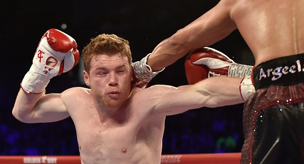 Canelo Alvarez knocks out Amir Khan during their May 7 duel at T-Mobile Arena in Las Vegas.