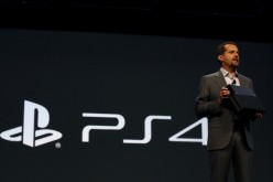 Andrew House, President and Group CEO Sony Computer Entertainment Inc., holds up a Playstation 4, not the PlayStation NEO 4K