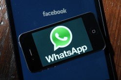 Facebook and WhatsApp logos are displayed on portable electronic devices