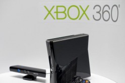 The new XBox 360 console and Kinect peripheral (L) is on display as it's revealed at Microsoft's press briefing ahead of the Electronic Entertainment Expo (E3) at the Wiltern Theater June 14, 2010 in Los Angeles, California.