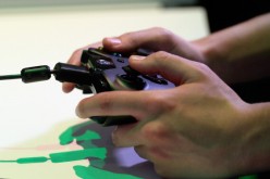 An Xbox One, not the Xbox Two, controller is used at the Microsoft Xbox booth during the Electronics Expo 2013