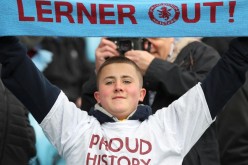 An Aston Villa fan supports the club's sale and former owner Randy Lerner's departure.