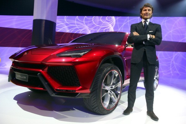  Stephan Winkelmann, CEO of Lamborghini Automobili S.p.A., poses next to a Lamborghini Urus during a Audi group reception on March 11, 2013 in Munich, Germany. 