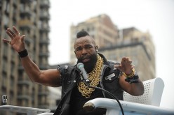 Mr. T is addressing the fans at the Flatiron Plaza in New York City.