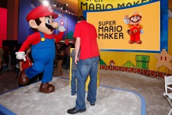 'Super Mario' performs at the Nintendo exhibit during the Annual Gaming Industry Conference E3 at the Los Angeles Convention Center on June 16, 2015 in Los Angeles, California. 
