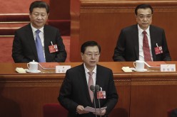 Zhang Dejiang (front), Chairman of the National People's Congress (NPC) Standing Committee speaks during the closing session of the NPC in the Great Hall of the People on March 16, 2016 in Beijing.